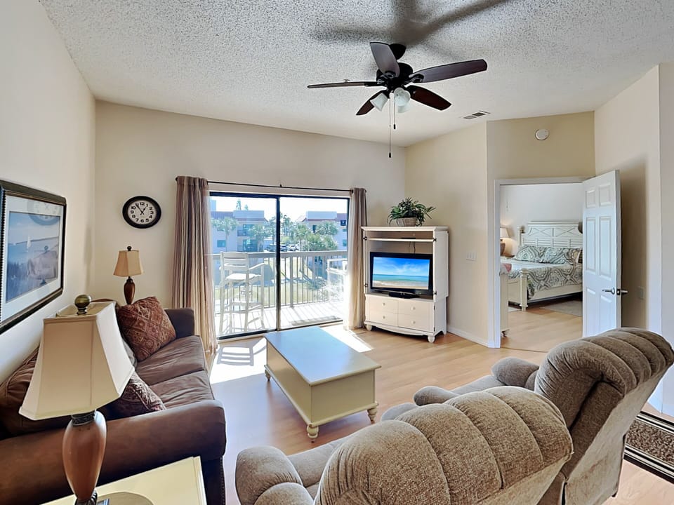 Living Room - Balcony Access, Sleeper Sofa + TV