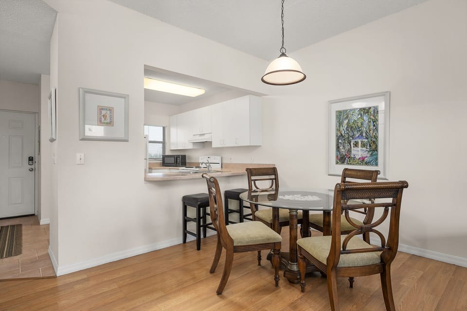 Dining Area - Seating for Four + Breakfast Bar Seating for Two