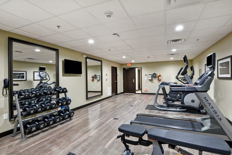Gym with free weights and exercise machines.