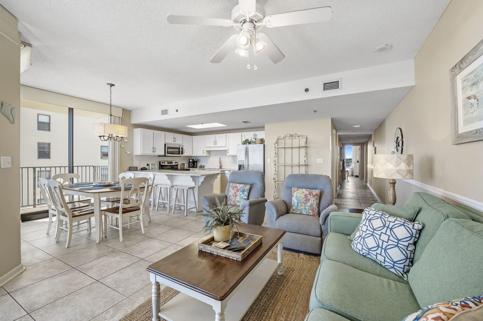 Spacious Living Area with a Queen Size Sleeper Sofa and access to Private Balcony