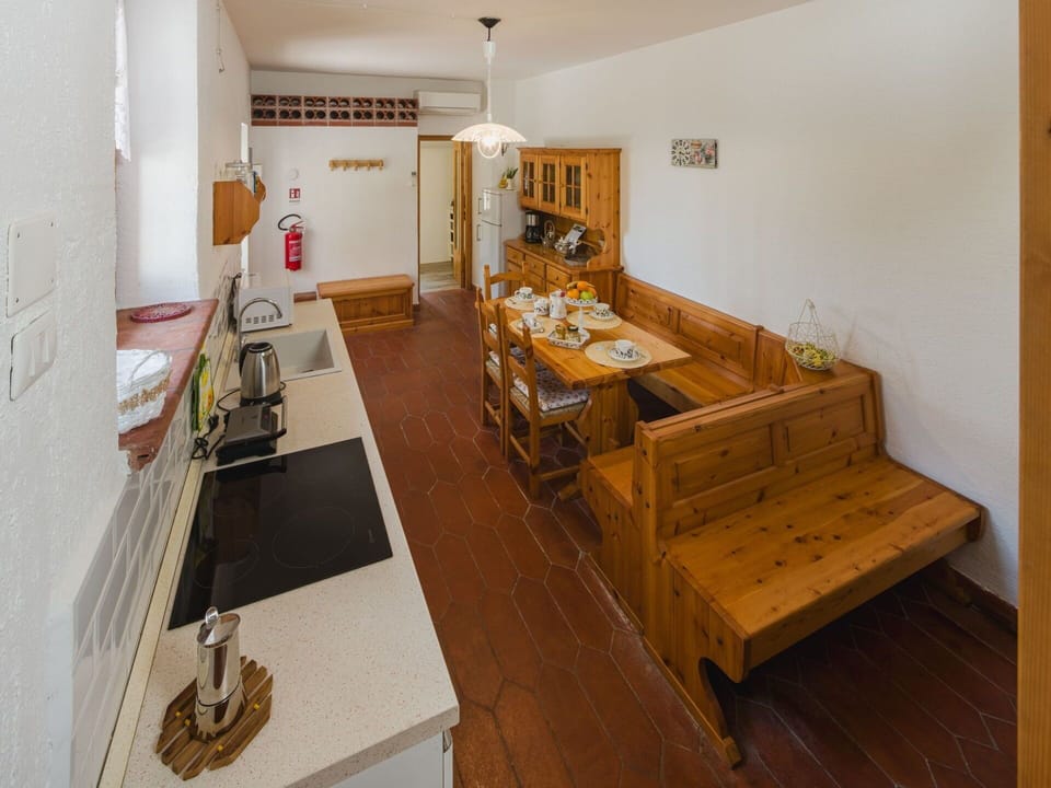 Furniture, Flooring, Interior Design, Wood, Floor, Ceiling, Cabinetry, Countertop, Kitchen, Room