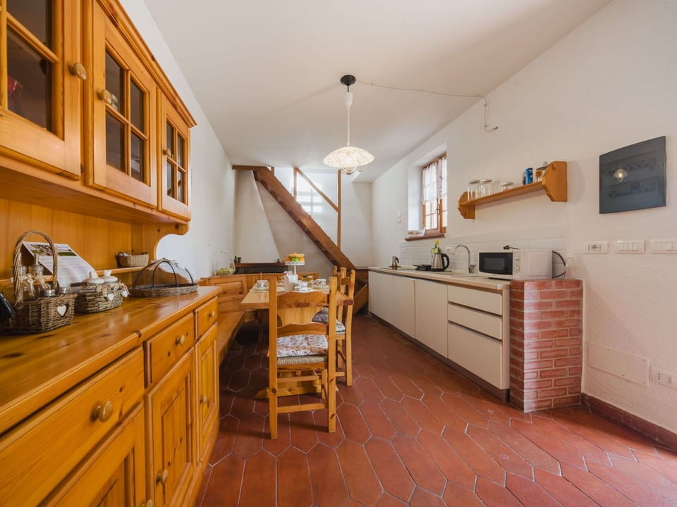 Furniture, Flooring, Interior Design, Wall, Kitchen, Countertop, Cabinetry, Floor, Wood, Ceiling