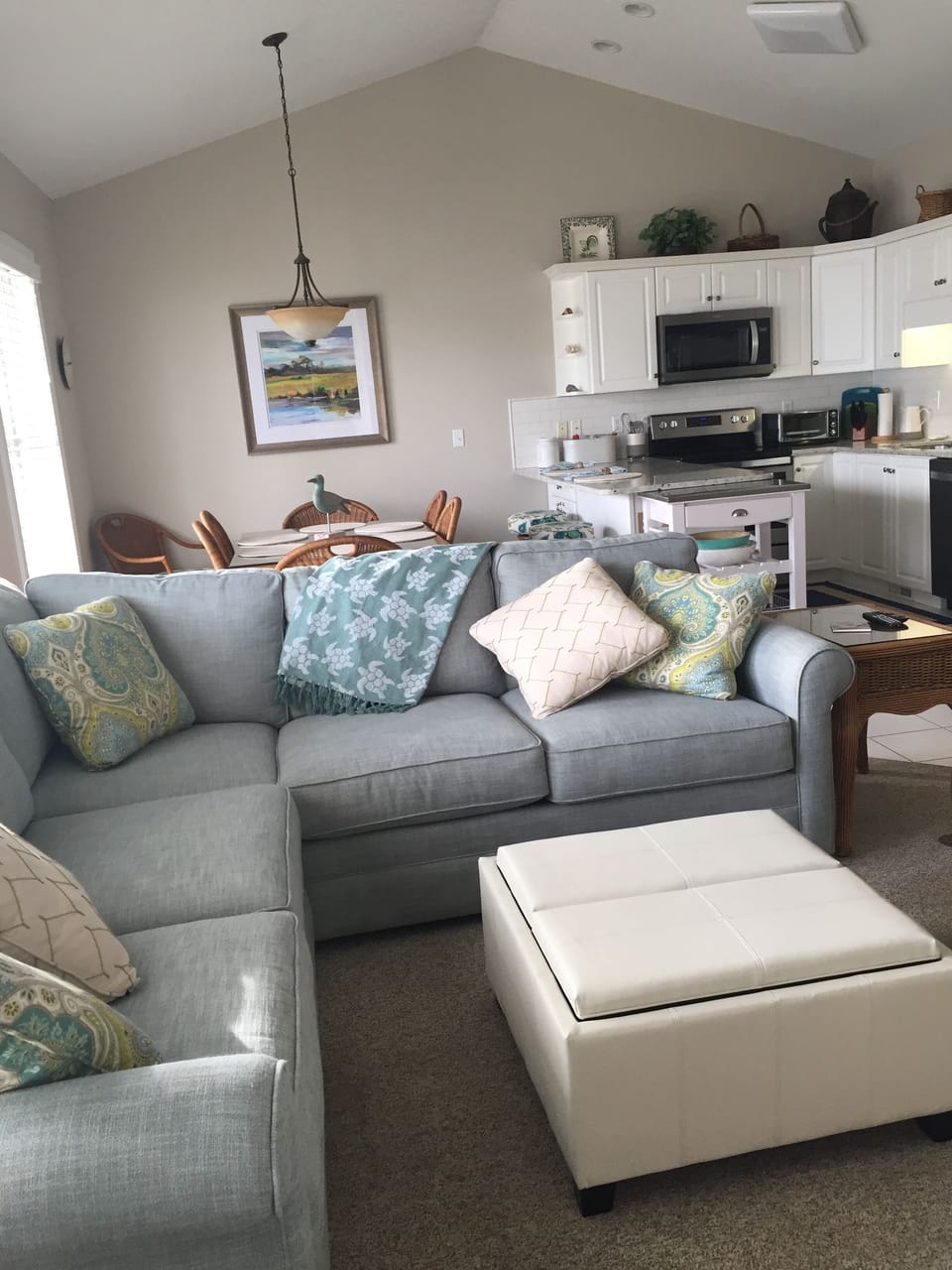Living Room w/ Sectional Couch and Cocktail Ottoman with Serving Trays