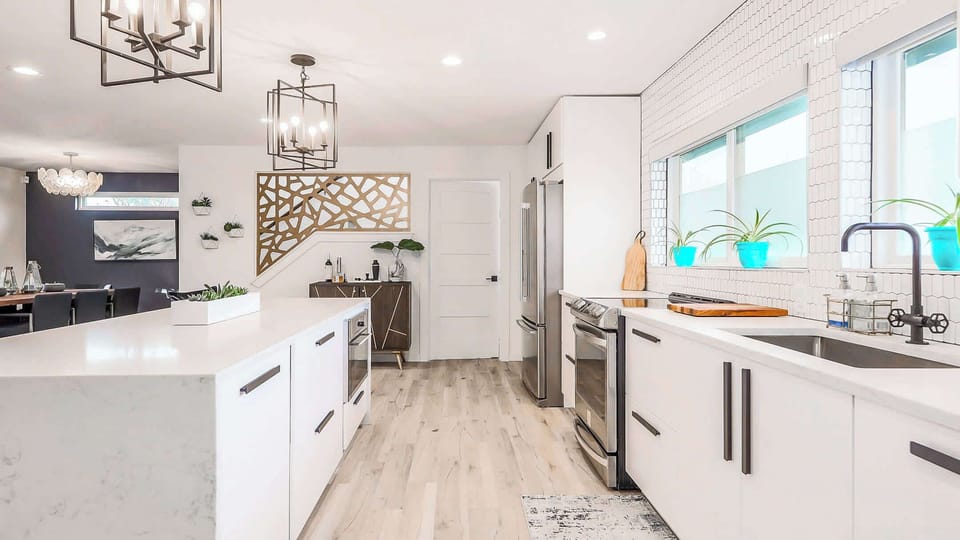 The laundry room is behind this door in the kitchen and is available for guest use!