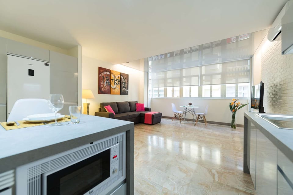 Sofa and windows from the Kitchen