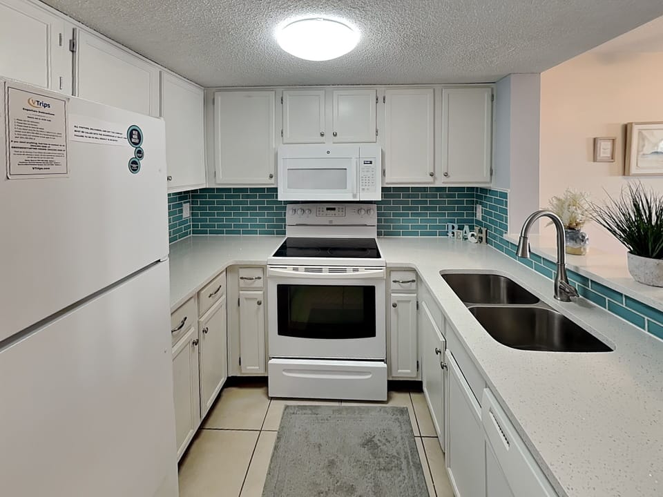 Kitchen - Fully Stocked Kitchen, Open Layout Connecting To Living Area