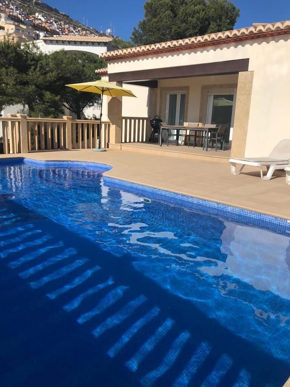 View across the pool to the naya and up the mountain side