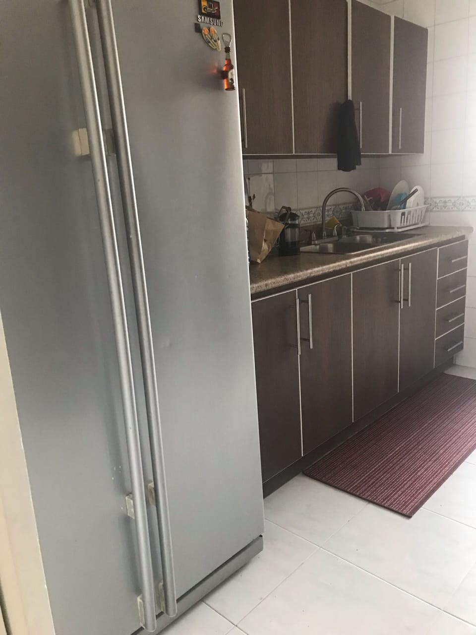 Full size fridge and freezer in kitchen