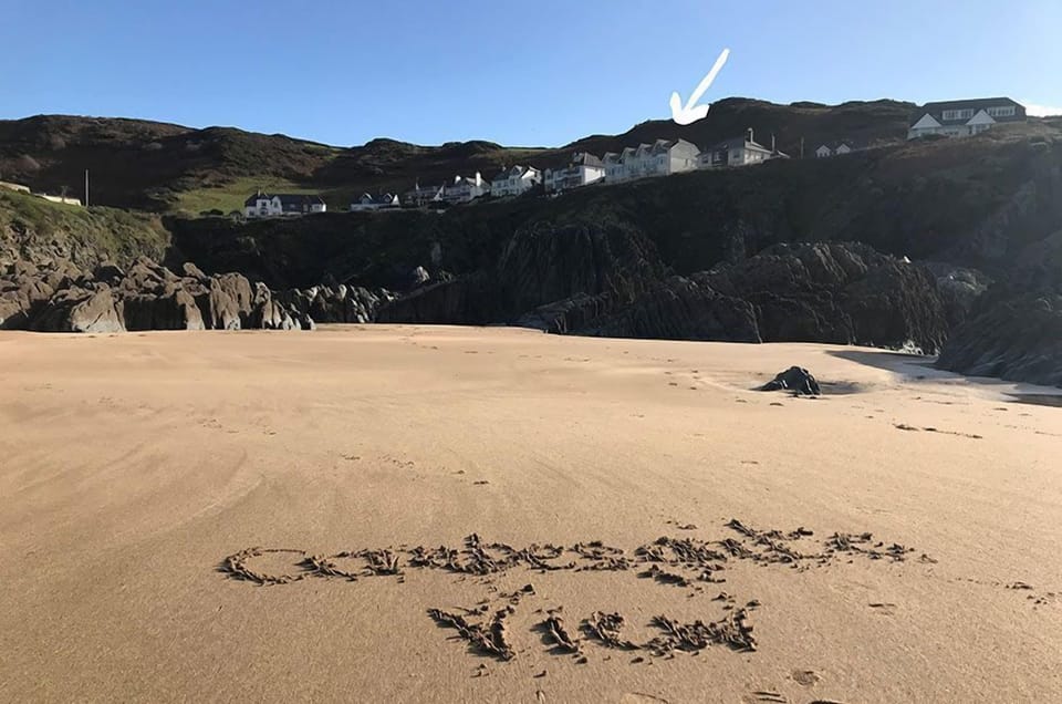 just above the beach!