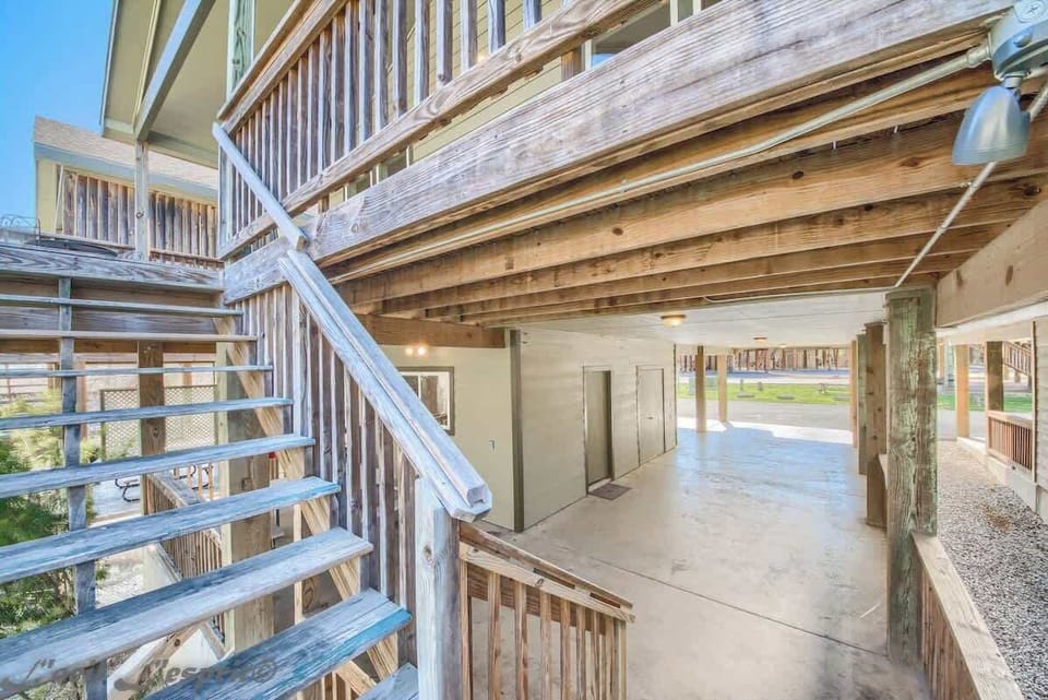Stairs leading up from carport to the wonderful Cowboy Lodge! 