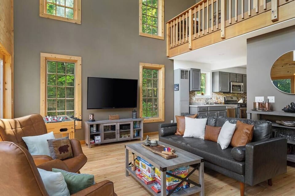 Open concept living room and kitchen with Smart TV to utilize all of your favorite streaming apps.