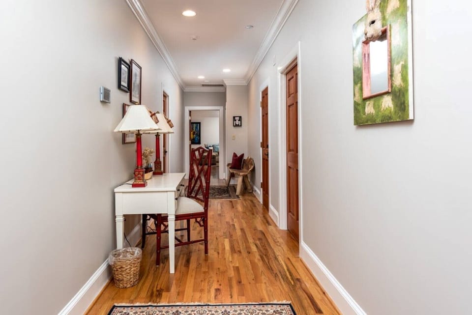 Second floor hallway to 2 King & 1 Queen BR suites, Laundry Room & Media Room