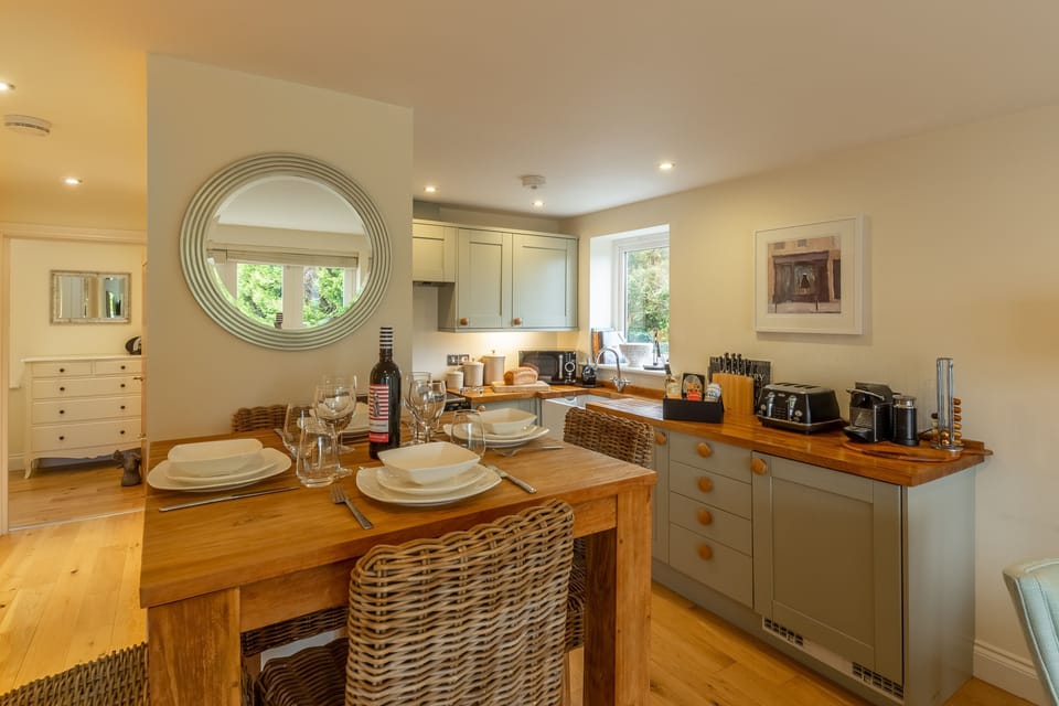 6 Sandy Lane, Carbis Bay. First floor: The shaker style kitchen with a view to the master bedroom