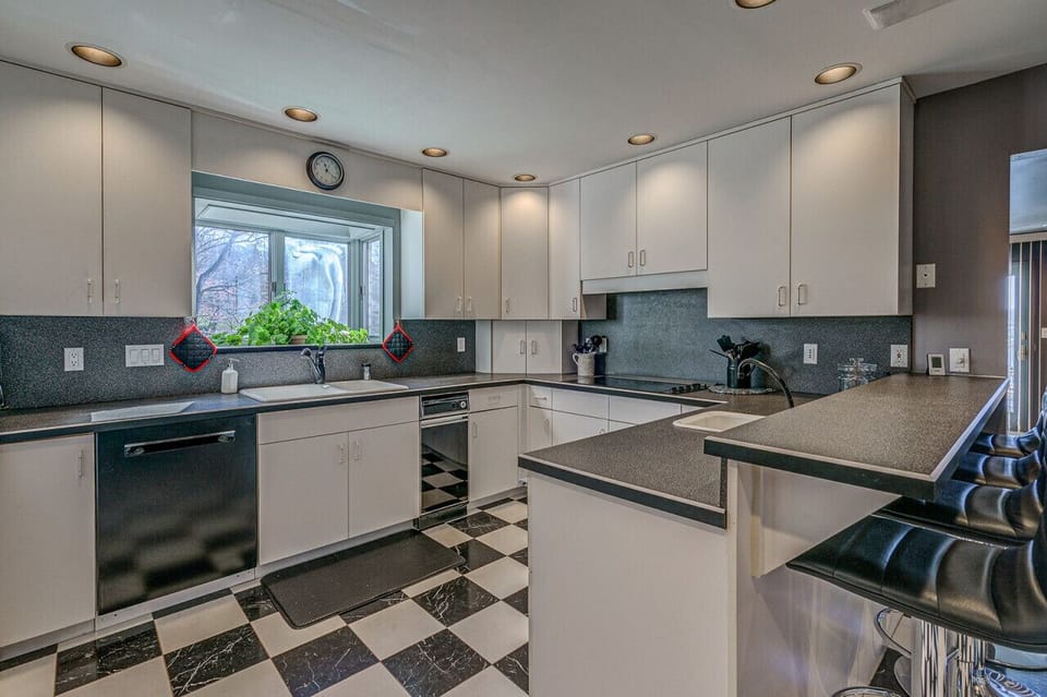 Sleek kitchen design with all the utensils you need for home-cooked meals