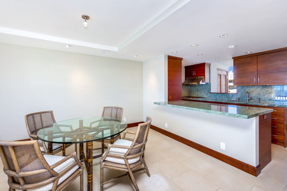 Dining Area and Kitchen - Dining areas seats four people and is adjacent to the fully-equipped, gourmet kitchen.