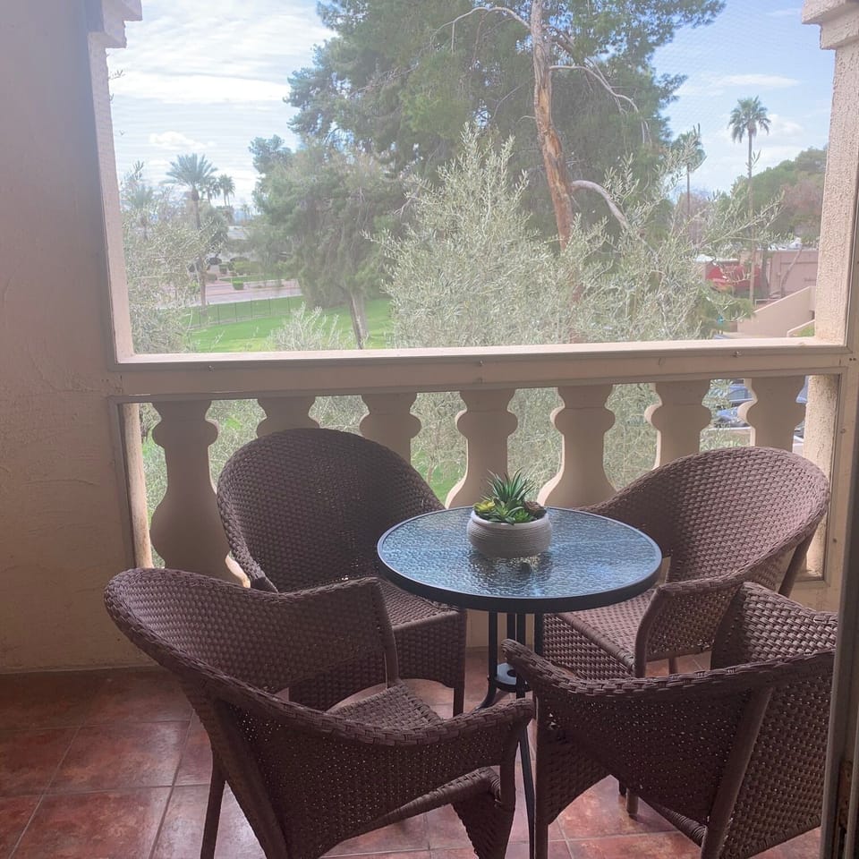 Balcony with Golf Course & Palm Trees
