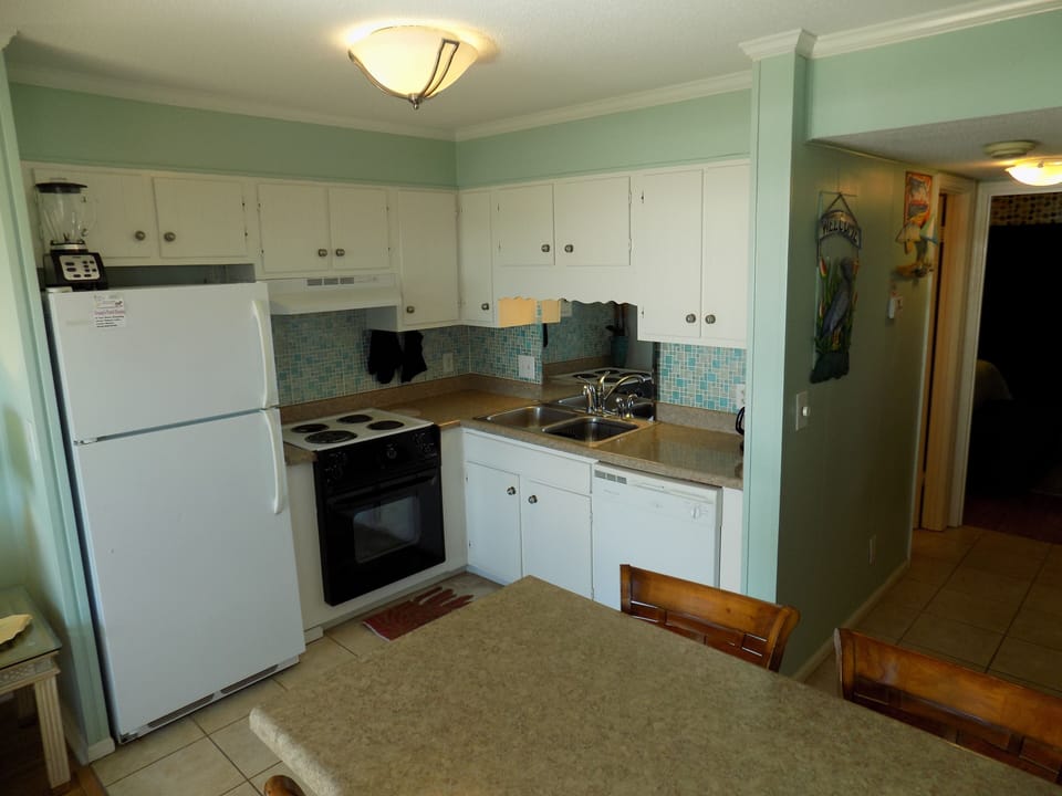 Cooking is easy in this fully equipped  kitchen. 