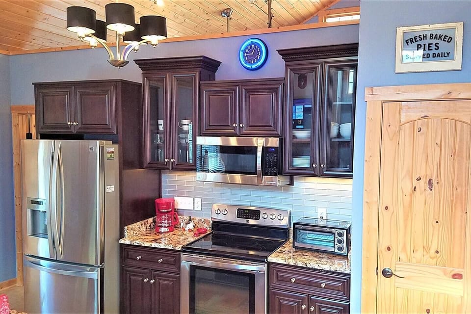 Stainless appliances and granite countertops.