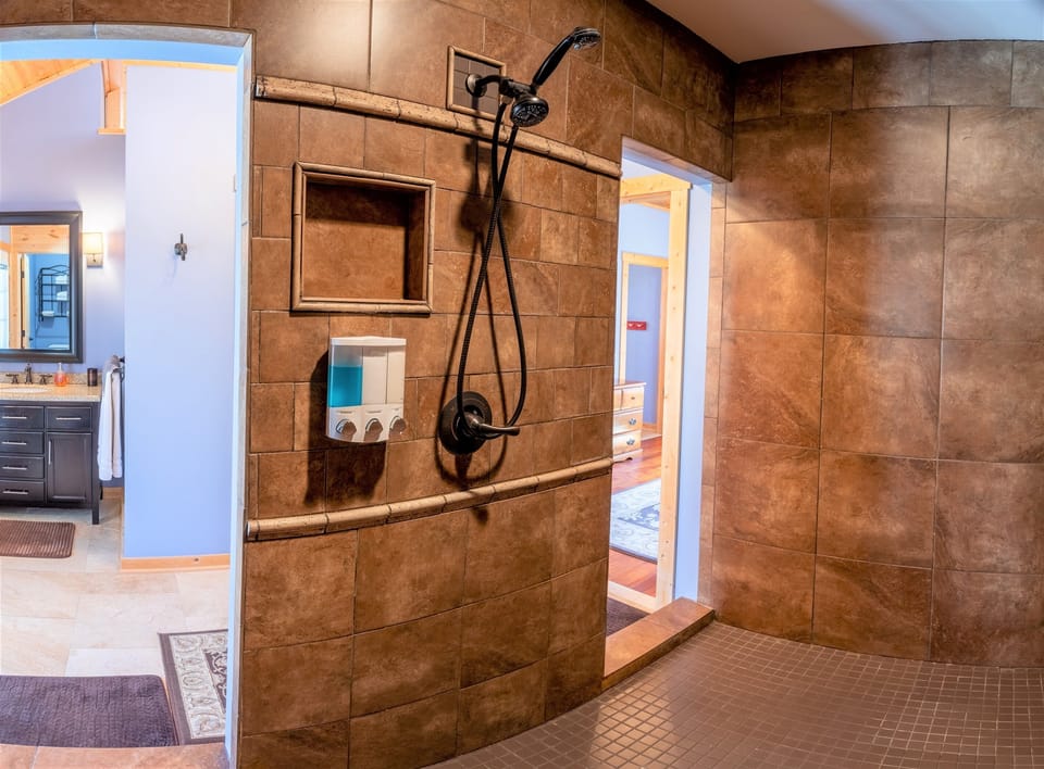 Inside the crazy Master Bathroom Shower 'room'