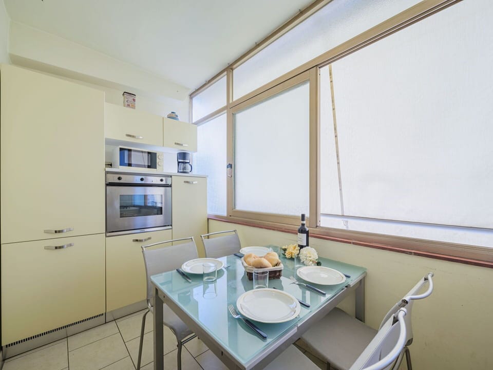 Property, Furniture, Table, Cabinetry, Wood, Window, Interior Design, Tableware, Building, Shelf