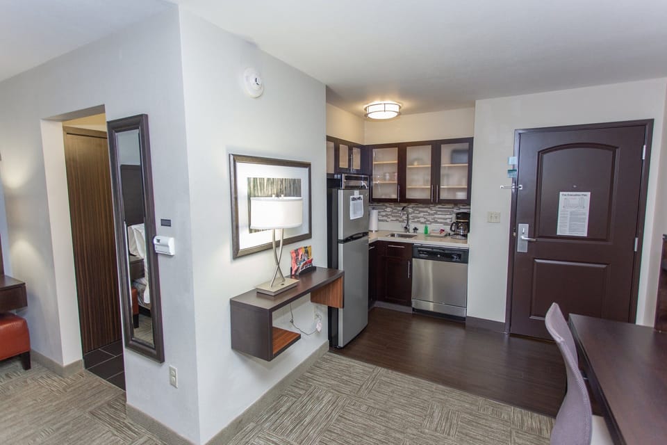 Kitchen with modern appliances and cabinetry.
