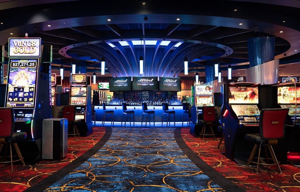 Local gaming and entertainment venue with slot machines nearby.