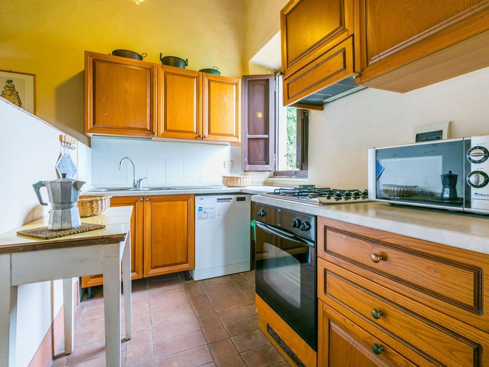 Cabinetry, Countertop, Furniture, Property, Kitchen Appliance, Kitchen Stove, Kitchen Sink, Kitchen, Home Appliance, Building