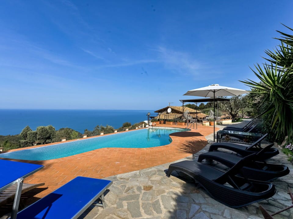 Blue, Horizon, Sea, Coast, Coastal And Oceanic Landforms, Resort, Ocean, Eco Hotel, Shore, Resort Town