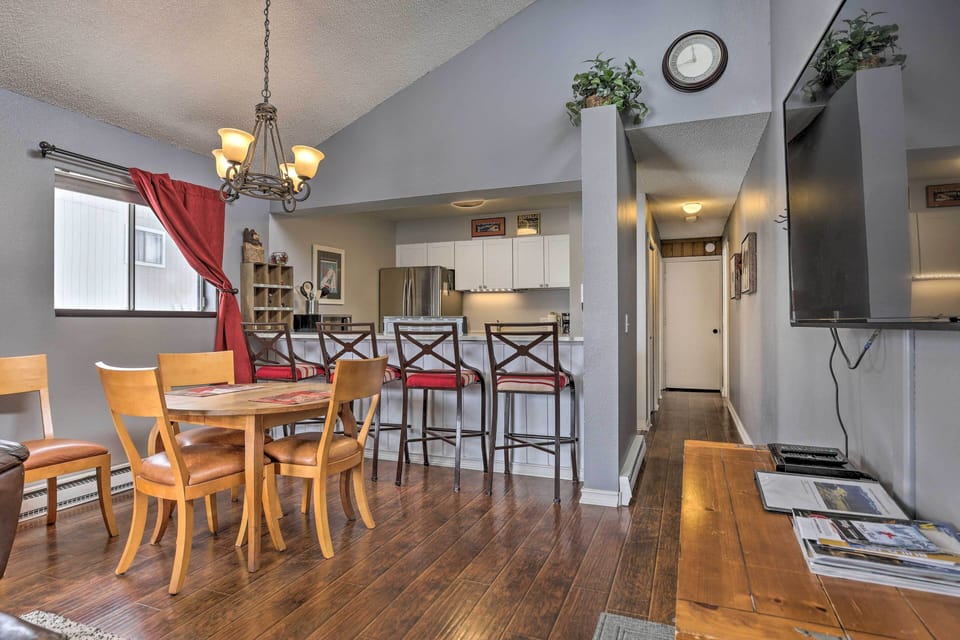 Keep the person cooking company by hanging out at the breakfast bar.