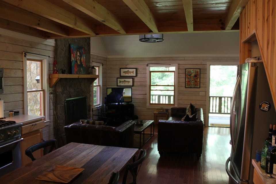 Open kitchen and living room, loft above.