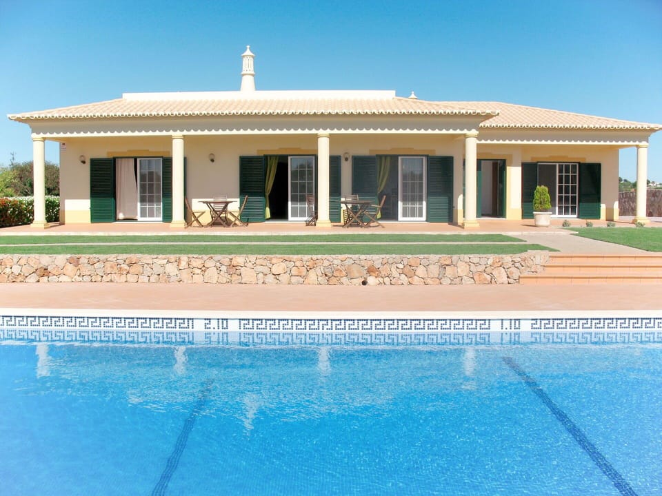 Water, Sky, Building, Azure, Swimming Pool, Window, Shade, Door, Leisure, House