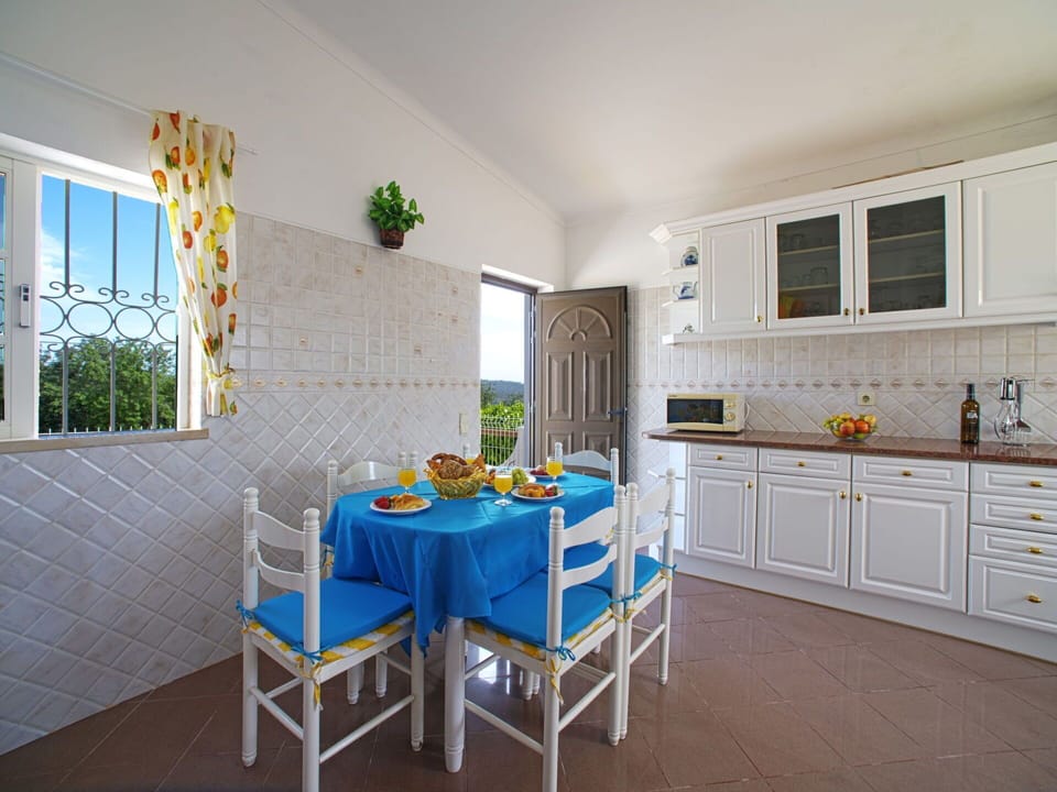 Cabinetry, Furniture, Property, Table, Countertop, Window, Interior Design, Chair, Kitchen, Drawer