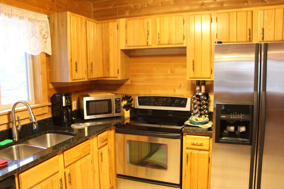 Full kitchen, pantry, spices, coffee maker, knives.  Water & ice from the fridge