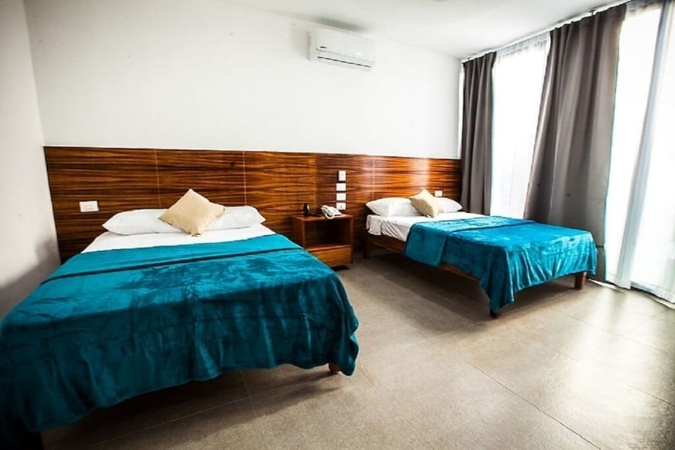 HABITACION SUITE ; 2 CAMAS MATRIMONIAL 