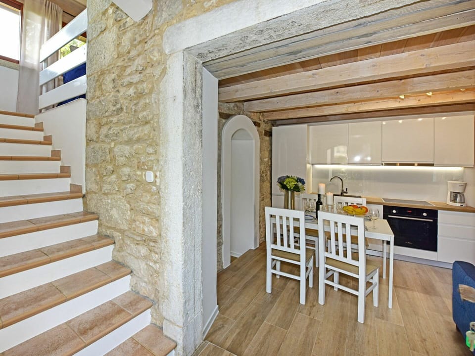 Property, Building, Wood, Lighting, Interior Design, Wall, Flooring, Floor, Wood Stain, Chair