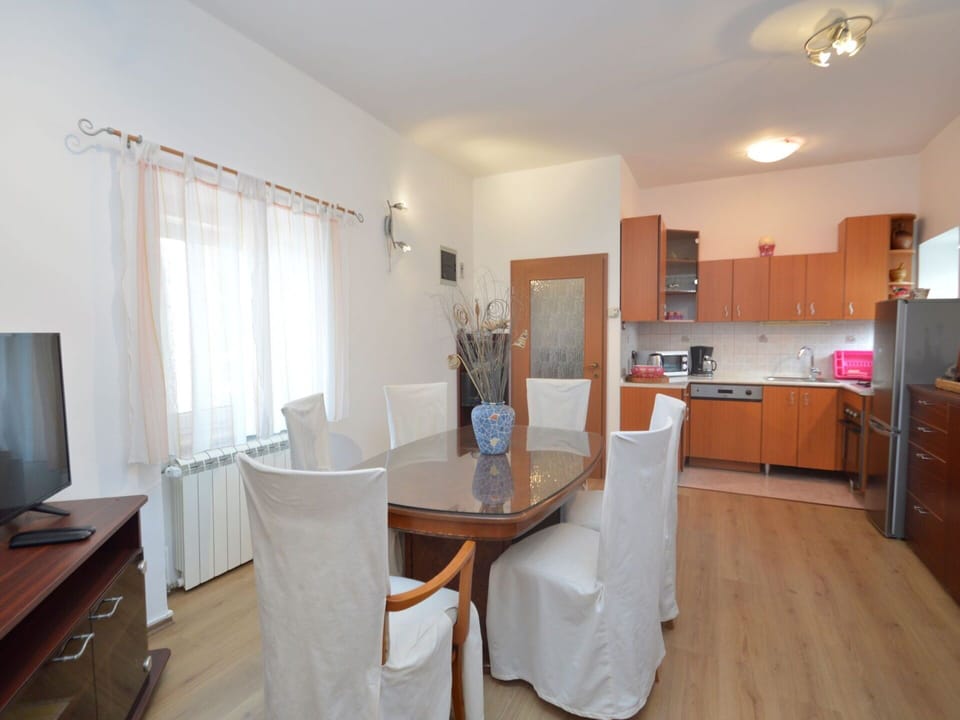 Furniture, Property, Cabinetry, Table, Countertop, Lighting, Building, Wood, Interior Design, Floor