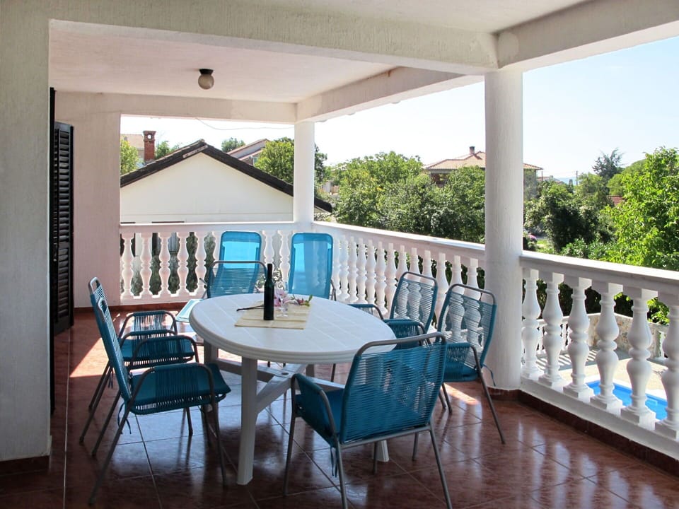 Table, Furniture, Property, Chair, Sky, Interior Design, Shade, Building, Porch, Floor