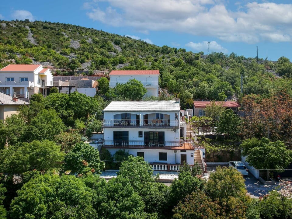 Cloud, Sky, Building, Window, Azure, Plant, Tree, Vegetation, Natural Landscape, Urban Design