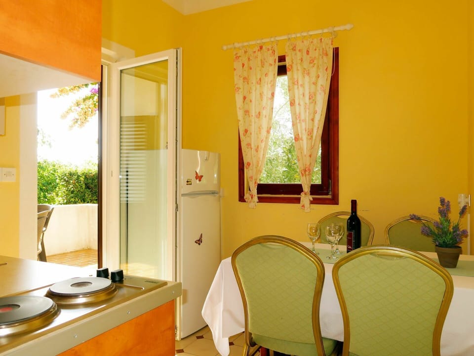 Room, Property, Yellow, Interior Design, Furniture, Orange, Building, House, Real Estate, Table