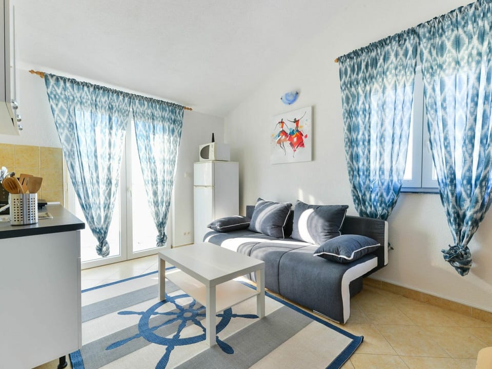 Furniture, Couch, Building, Blue, Window, Table, Comfort, Interior Design, Shade, Curtain