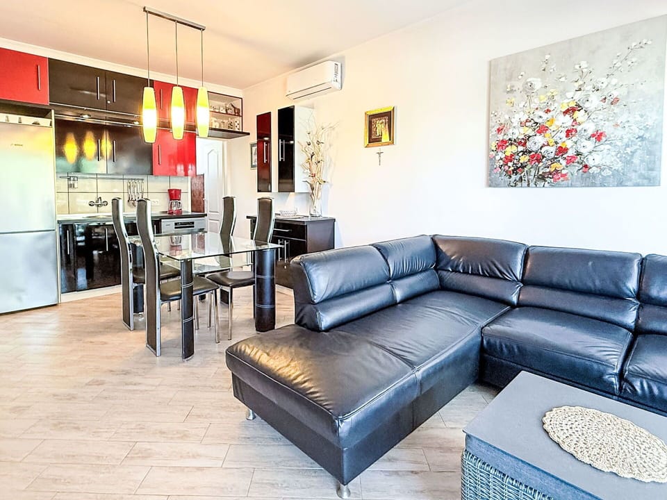 Furniture, Interior Design, Couch, Flooring, Floor, Living Room, Room, Ceiling, Table, Lighting