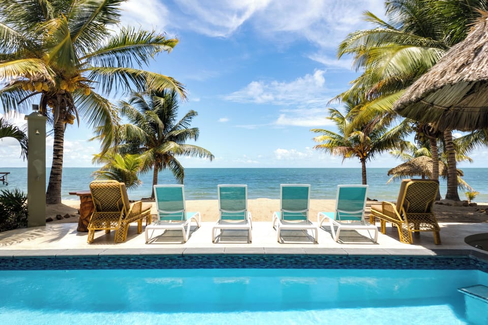 Sunbathing by pool - ocean side with outdoor shower
