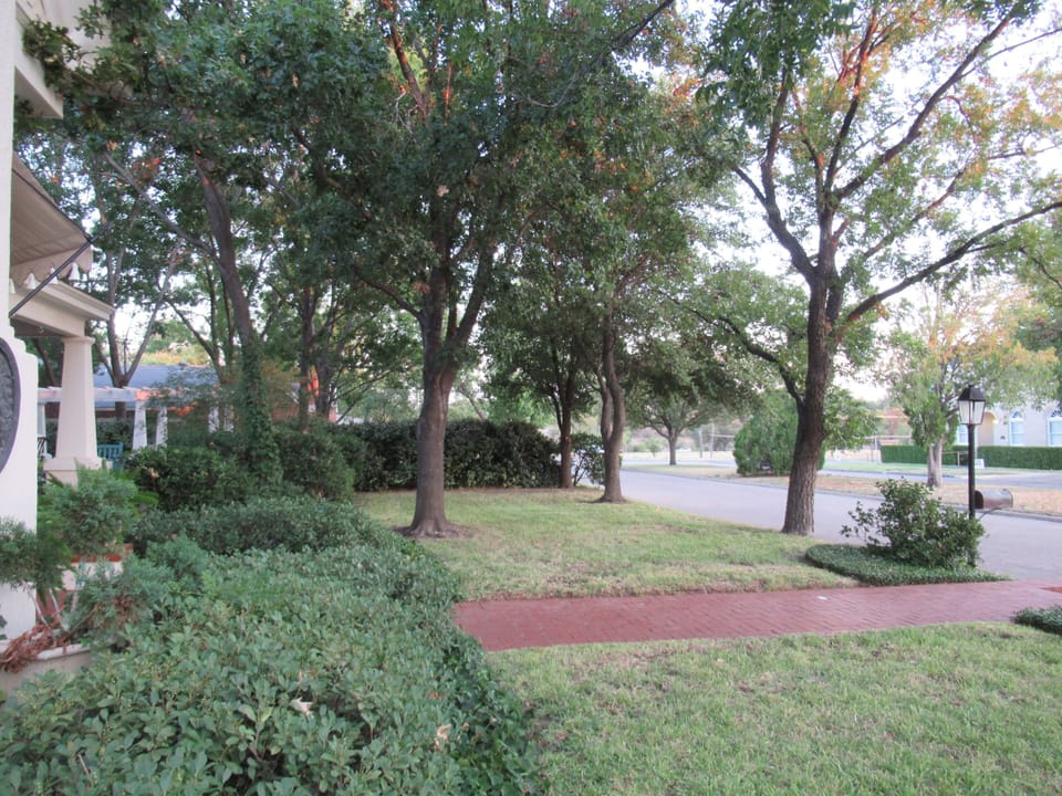view of golf course and river walk from front yard