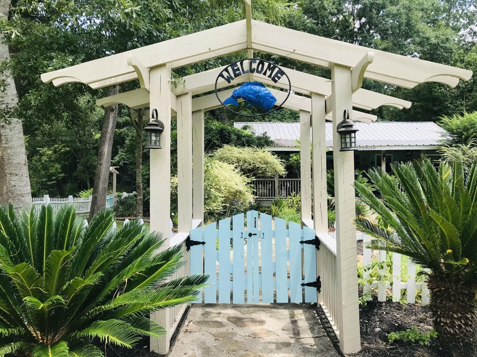 Welcome to "Bluegill Bungalow" private pergola entry with gates