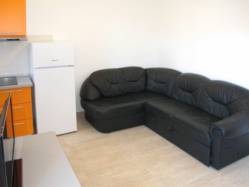 Couch, Furniture, Room, Property, Sofa Bed, Living Room, Floor, Comfort, Interior Design, Studio Couch