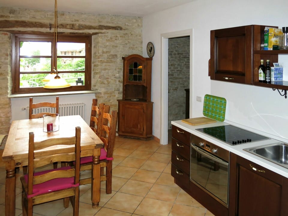 Cabinetry, Furniture, Property, Countertop, Table, Wood, Sink, Drawer, Chair, Kitchen