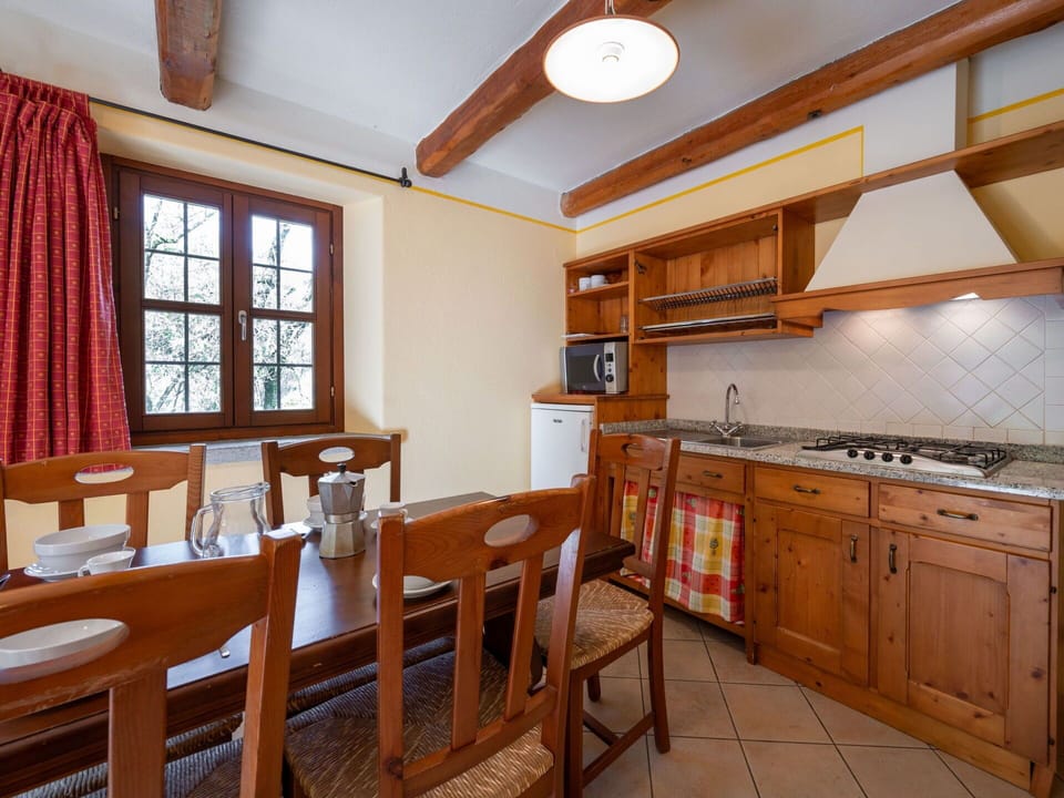 Furniture, Cabinetry, Table, Window, Curtain, Wood, Countertop, Interior Design, Kitchen, Drawer