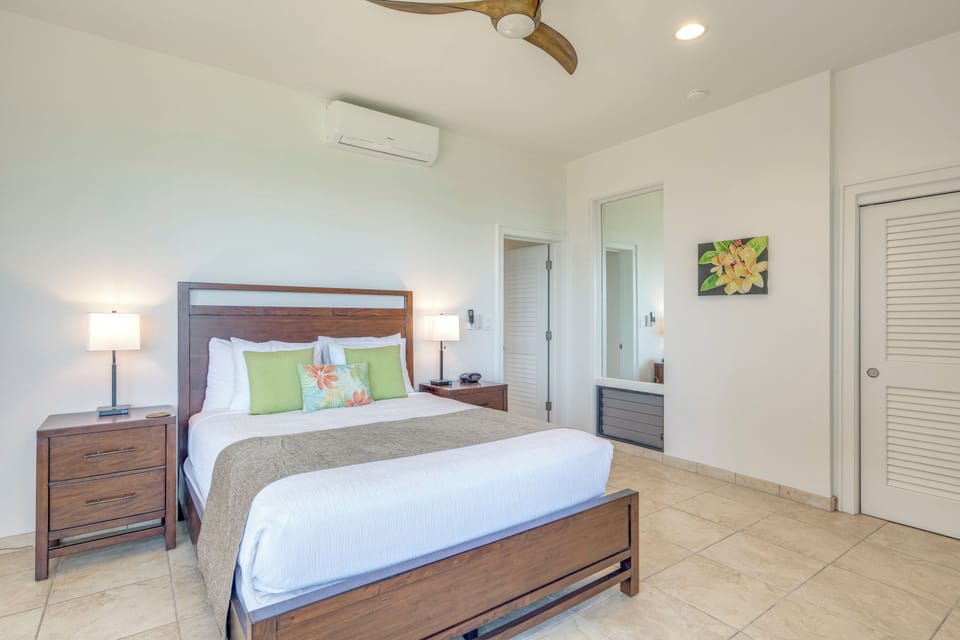 Bedroom has split AC system and overhead fan for optimal comfort.
