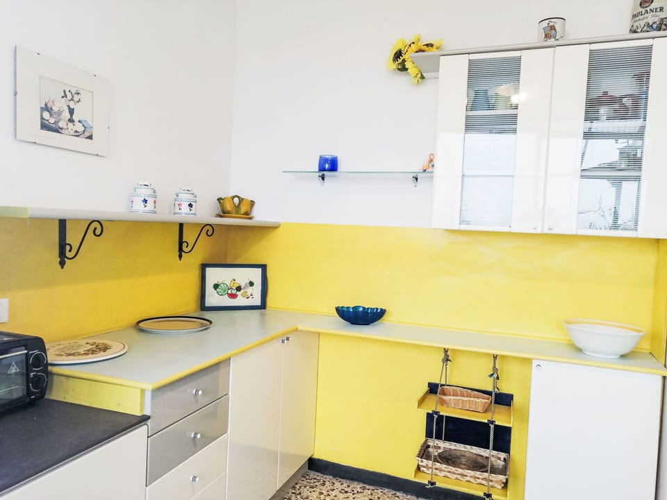 Property, Cabinetry, Window, Yellow, Interior Design, Drawer, Desk, Table, Floor, Flooring