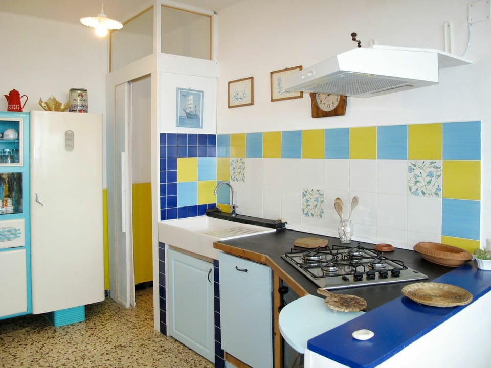 Property, Cabinetry, Blue, Kitchen Stove, Countertop, Gas Stove, Interior Design, Lighting, Kitchen, Kitchen Appliance